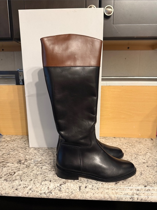 Saks Fifth Avenue Shoes - New in box. Saks fifth Avenue Kensington riding boot in black with brown trim